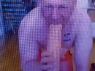Faggot suck a big dildo